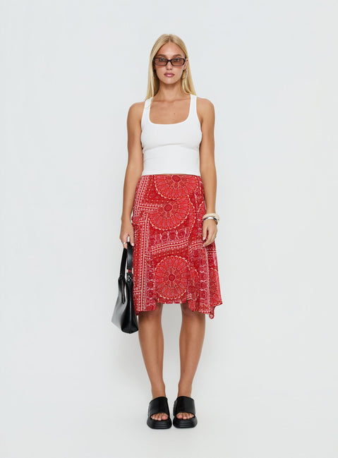   front view of model wearing Princess Polly Raenah Asymmetrical Midi Skirt Red Paisley 