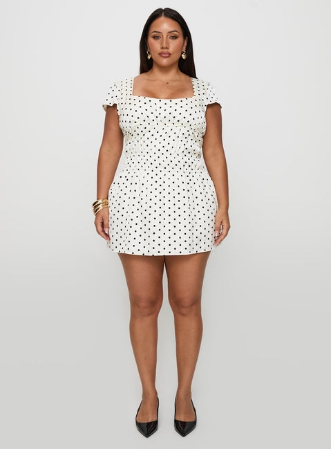 front view of model wearing Princess Polly Evangelie Ruched Mini Dress White Polka Curve Square Neck 