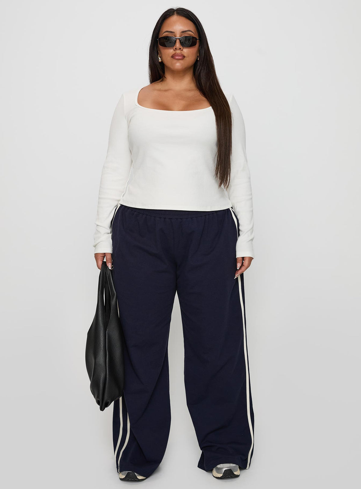 front view of model wearing Princess Polly Baseline Long Sleeve Top White Curve Full Sleeves Square Neck 