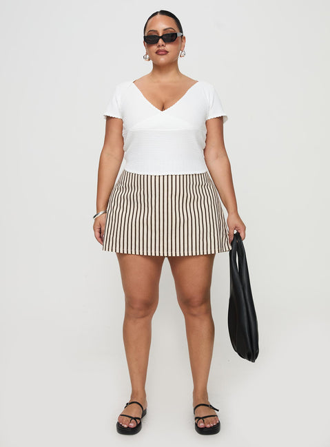 front view of model wearing Princess Polly Gigi Skort Beige Stripe Curve High Waisted Shorts 