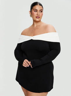 back view of model wearing Princess Polly Distractions Off The Shoulder Mini Dress Multi Curve High Neck 