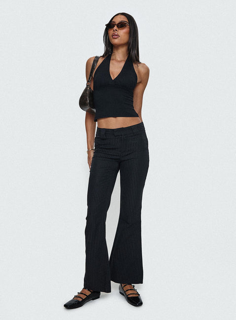 back view of model wearing Princess Polly Jinxed Pant Black Low Rise Pants Pants 
