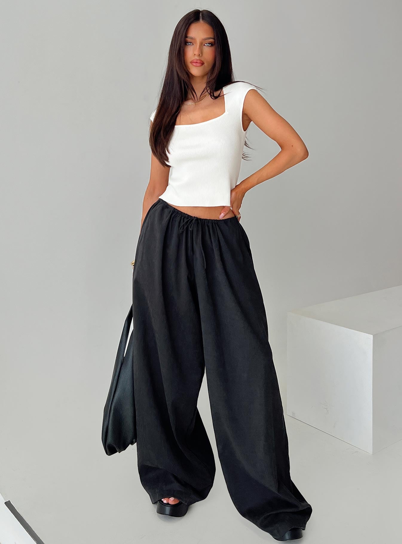 front view of model wearing Princess Polly Harbour Pant Black Petite High Waisted Pants 