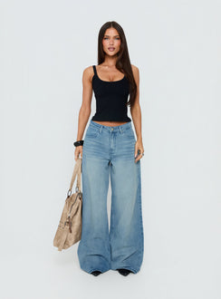 Showcasing Naylor Mid Rise Wide Leg Jeans Light Wash Denim Light Blue Wash Petite in womens-jeans with mid-rise front view of model wearing