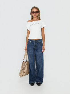 front view of model wearing Princess Polly Serenitia Mid Rise Straight Leg Relaxed Jeans Dark Blue Wash Mid Rise Jeans 