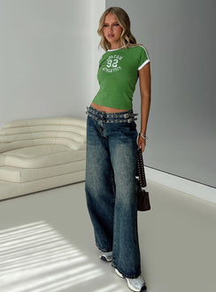 side view of model wearing Princess Polly Boston Athletics Top Green Short Sleeves Crew Neck 