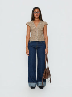 front view of model wearing Princess Polly Darla Low Rise Straight Leg Cuff Jean Dark Blue Wash Low Rise Jeans 