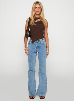 side view of model wearing Princess Polly Magic Mirror Mid Rise Bootleg Jeans Ice Wash Mid Rise 
