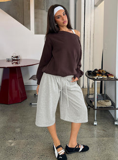 Showcasing the Nikko Longline Fleece Shorts Grey Marle in womens regular pants with mid-rise front view of model wearing Princess Polly