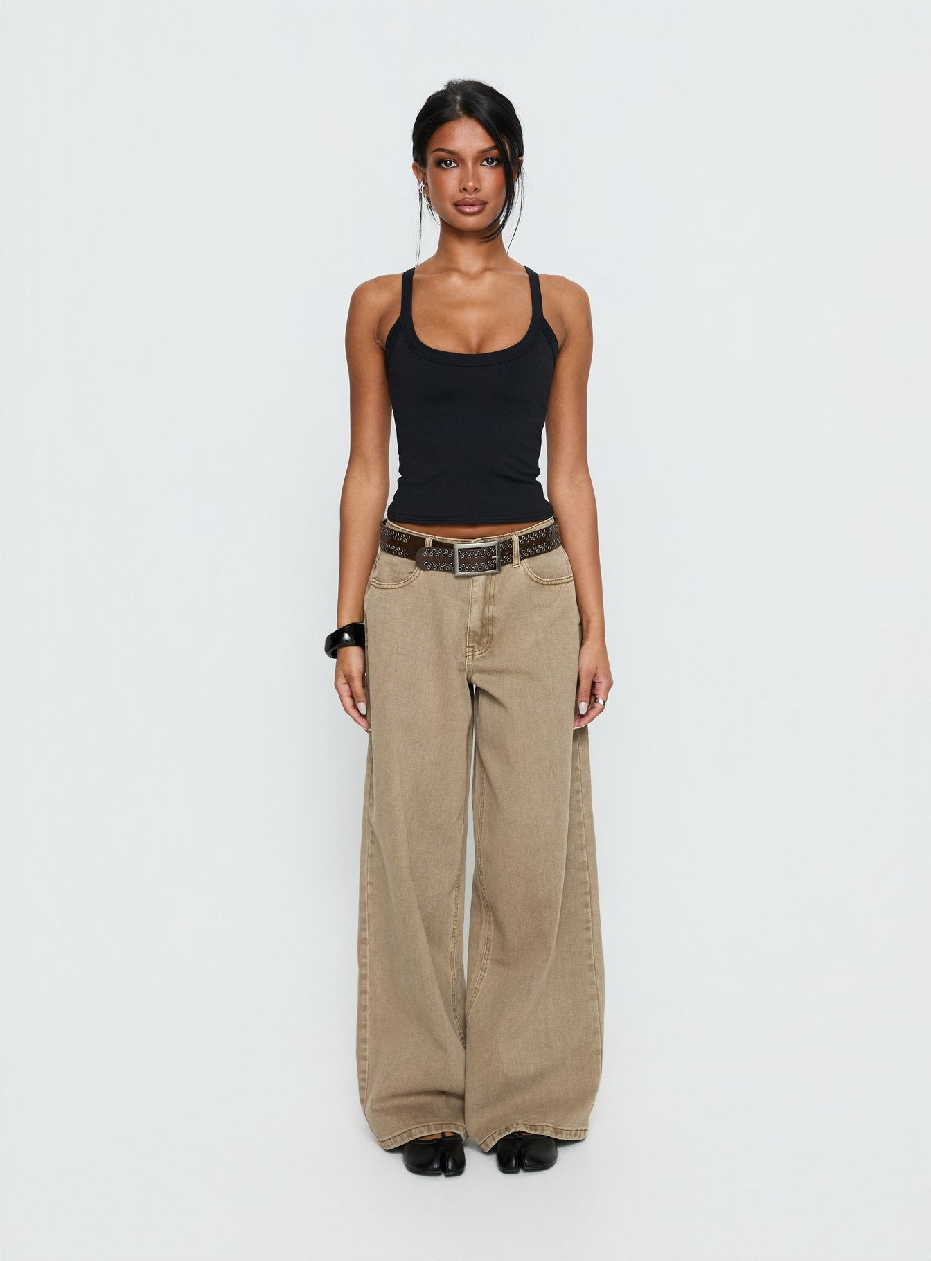 front view of model wearing Princess Polly Naylor Mid Rise Wide Leg Jeans Light Brown Wash Mid Rise Jeans 