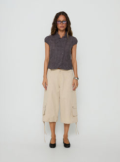 Featuring the Relaxer 3/4 Cargo Pants Beige in womens regular pants with mid-rise front view of model wearing Princess Polly