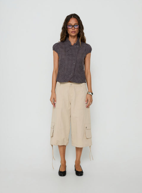 Featuring the Relaxer 3/4 Cargo Pants Beige in womens regular pants with mid-rise front view of model wearing Princess Polly