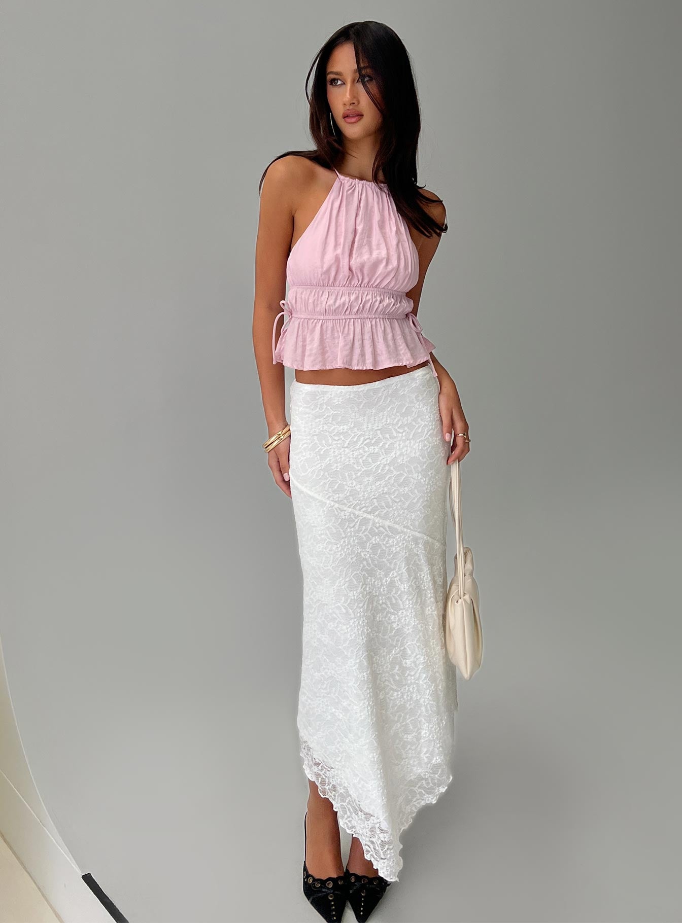 side view of model wearing Princess Polly Rozier Top Pink Sleeveless Crew Neck 