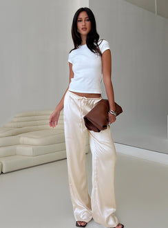 back view of model wearing Princess Polly Soulstar Satin Pants Champagne Low Rise Pants 