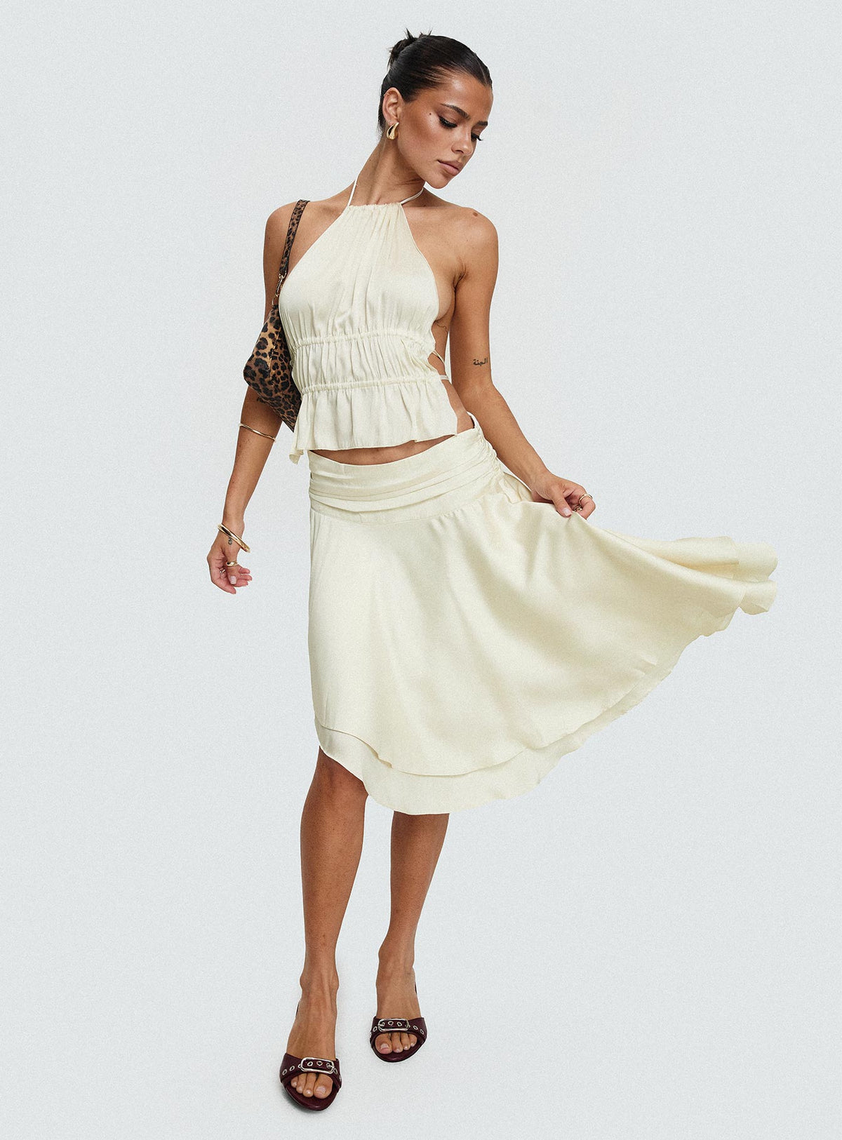 front view of model wearing Princess Polly Legacy Halter Top Ivory Sleeveless High Neck 