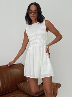 side view of model wearing Princess Polly Melona Shirred Mini Dress White Boat Neck 