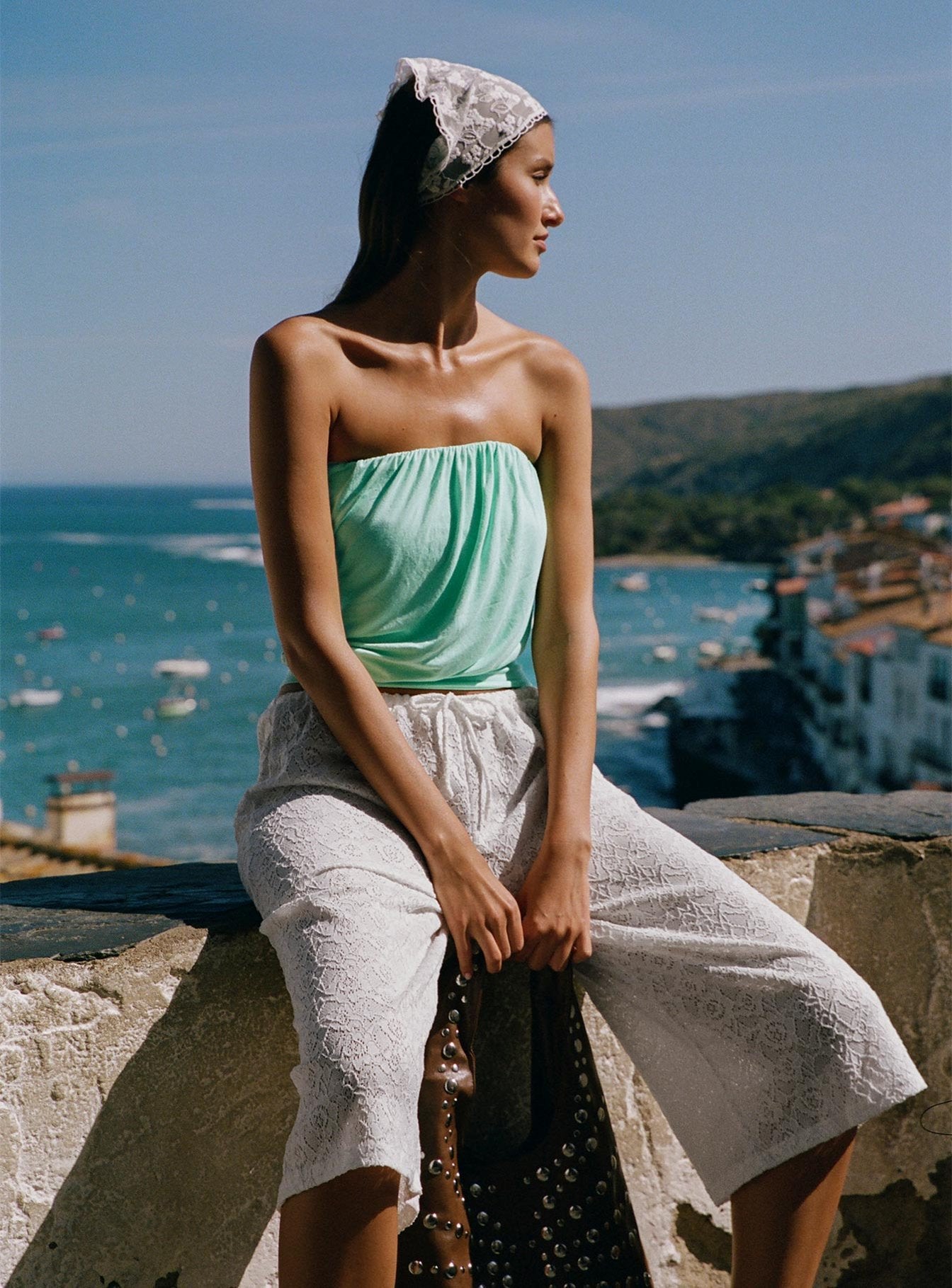 Discover the Kiss Me Quick 3/4 Lace Drawstring Pants in White featuring mid-rise womens-regular-pants side view of model wearing Princess Polly