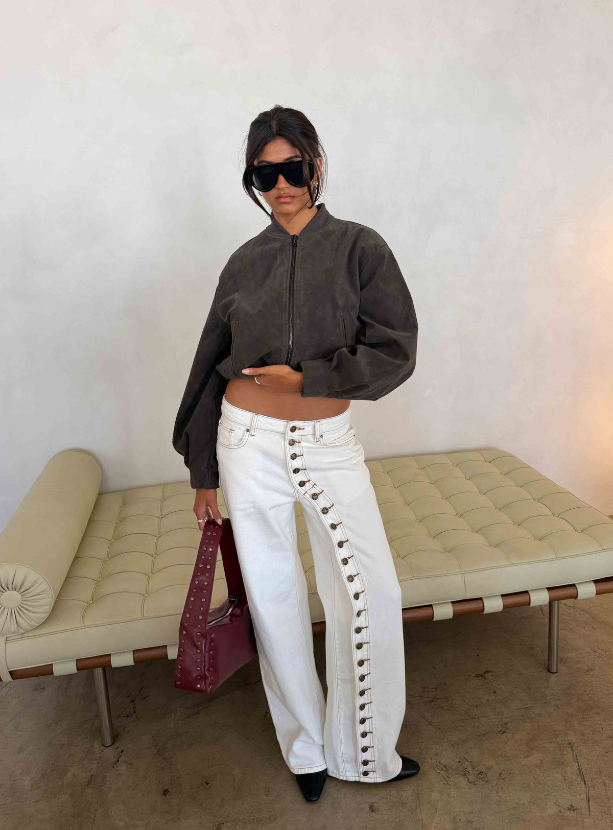 Showcasing the Penny Mid Rise Straight Leg Jeans White in womens-jeans with mid-rise front view of model wearing Princess Polly