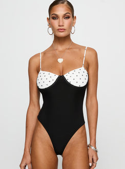 front view of model wearing Princess Polly Evette Bodysuit Black / White Sleeveless 