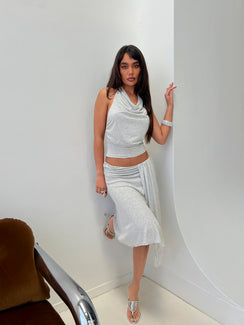 Showcasing the Iselda Draped Midi Skirt Grey Marle in womens-skirts with wrap detail and relaxed fit front view of model wearing Princess Polly