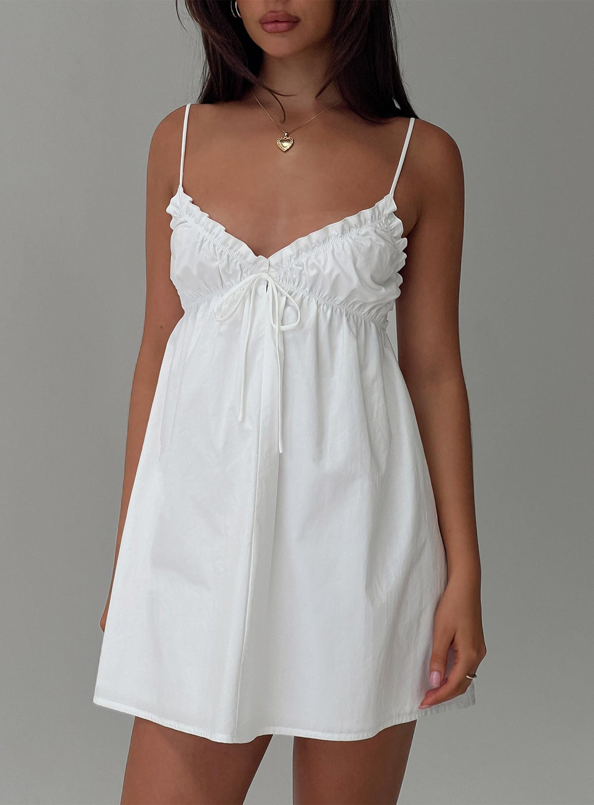 front view of model wearing Princess Polly Alchemy Mini Dress White V-Neck 