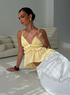 front view of model wearing Princess Polly Blondelle Frill Detail Top Yellow Sleeveless Plunger 