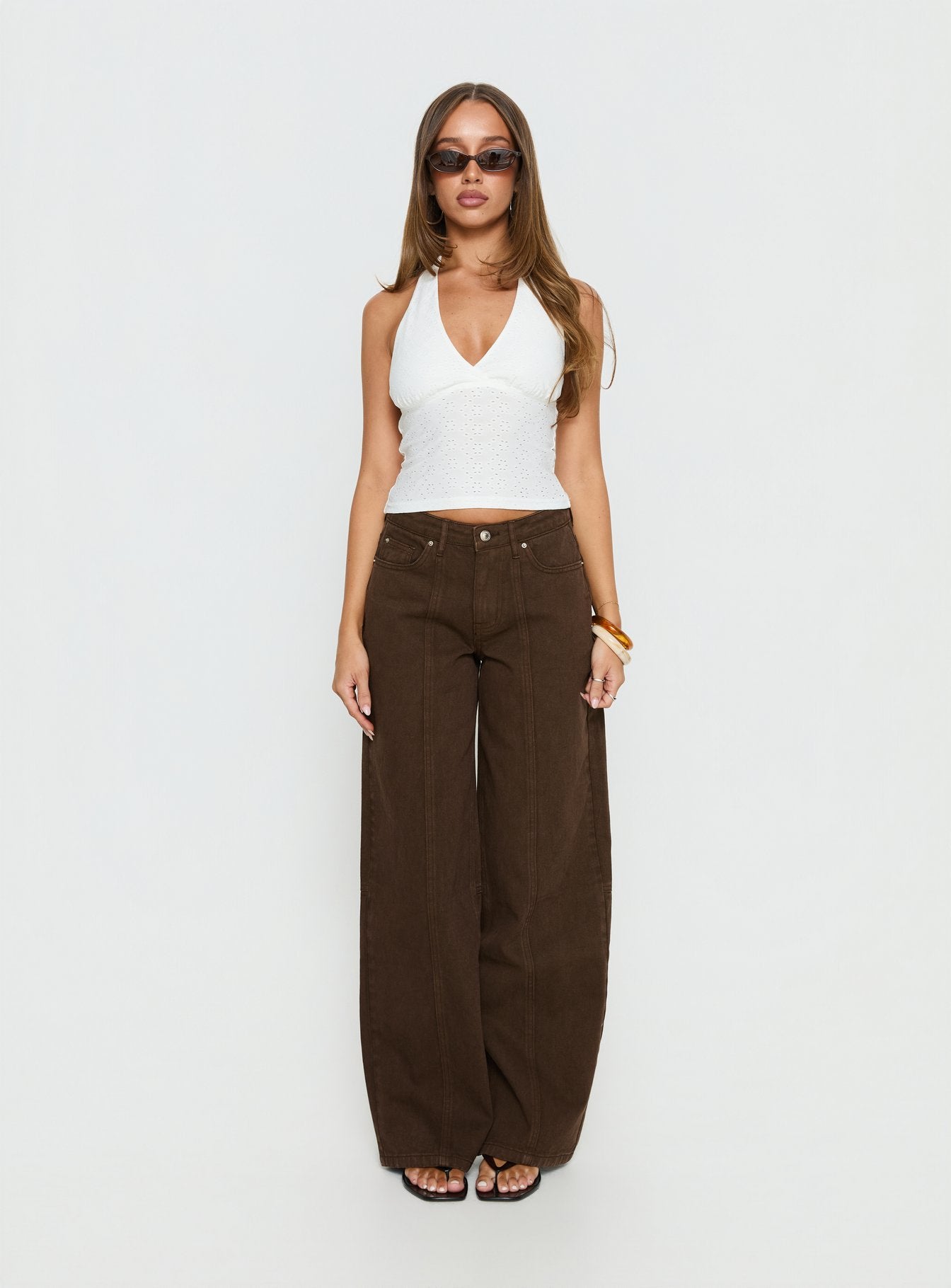 front view of model wearing Princess Polly Lando Low Rise Straight Leg Jeans Chocolate Mid Rise Jeans 