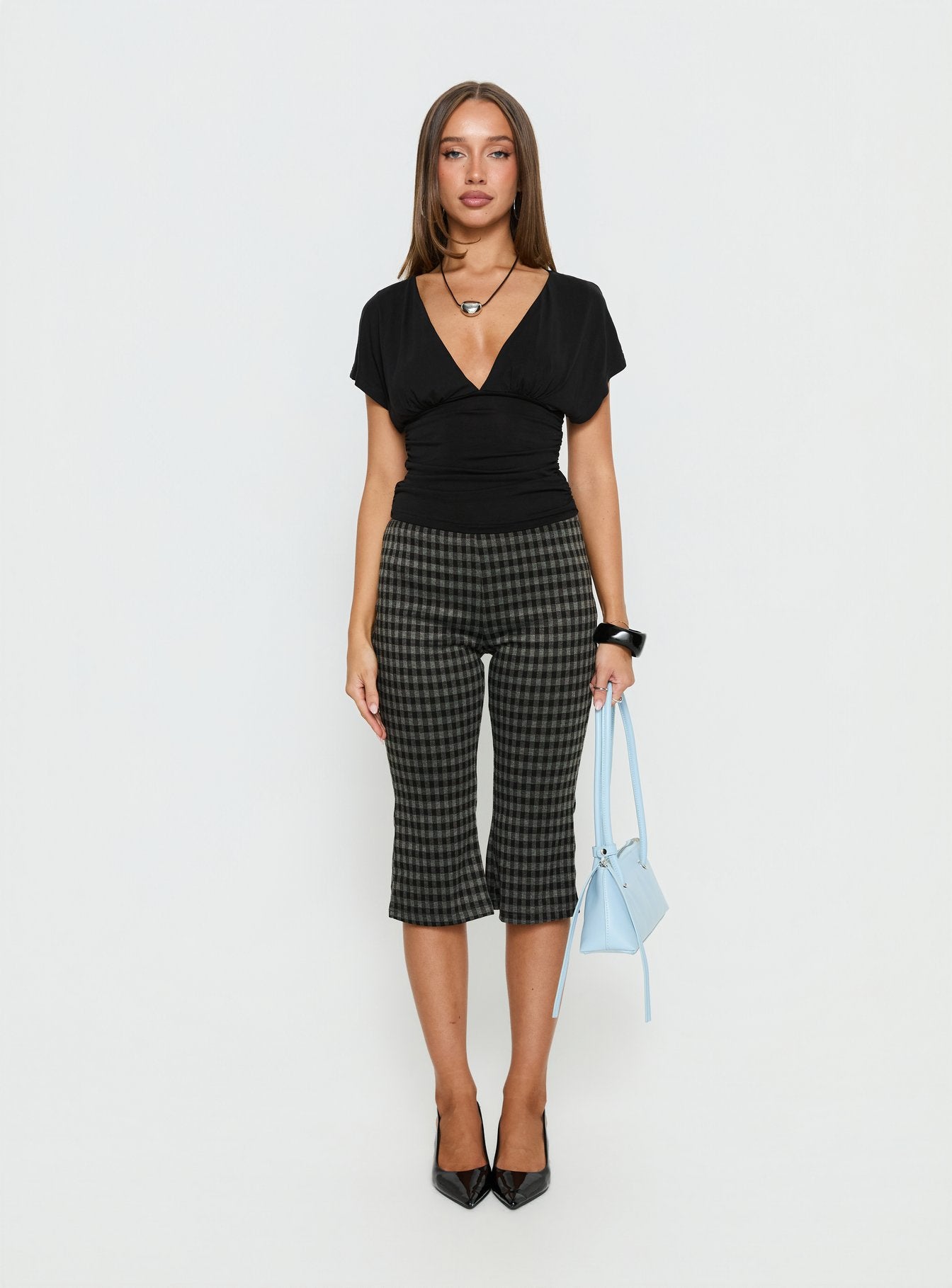 front view of model wearing Princess Polly Lights Are Off Capri Pants Multi Mid Rise Pants 