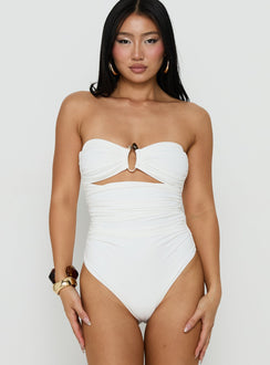 Crafted with sleeveless construction, the See Me Soon Strapless Hardware Detail Bodysuit White front view of model wearing Princess Polly