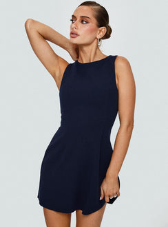 side view of model wearing Princess Polly Anse Mini Dress Navy Crew Neck 