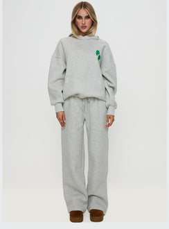 side view of model wearing Princess Polly Princess Polly Wide Leg Track Pant Bubble Text Grey Marle / Green Pants 