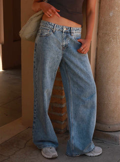 side view of model wearing Princess Polly Shima Low Rise Straight Leg Jeans Light Wash Low Rise Jeans Jeans 