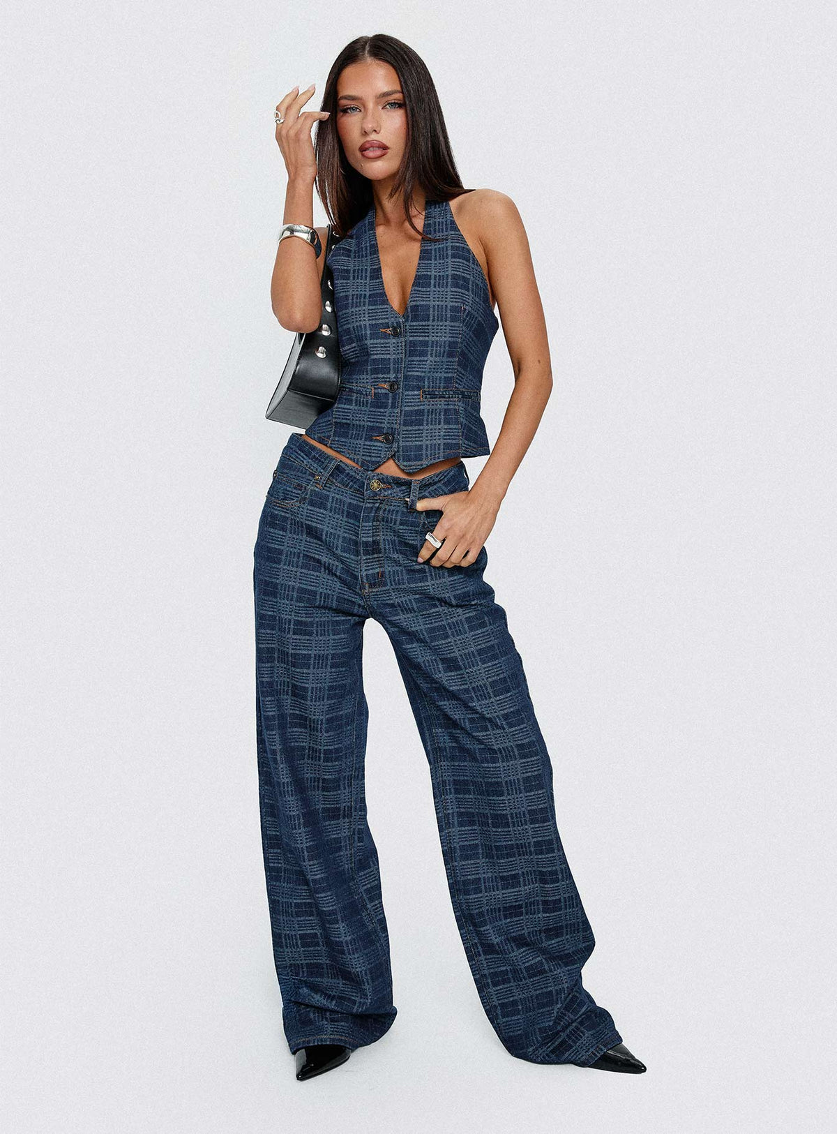 side view of model wearing Princess Polly Top Model Low Rise Straight Leg Jeans Indigo Plaid Mid Rise 