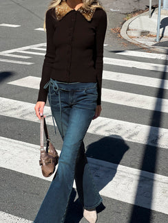 Showcasing Runa Low Rise Tie Side Jeans Mid Blue Wash in womens-jeans front view of model wearing Princess Polly