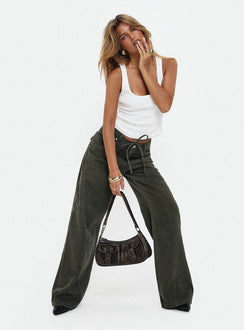 front view of model wearing Princess Polly Bruiser Tie Waist Mid Rise Wide Leg Jeans Green Petite High Rise Jeans 