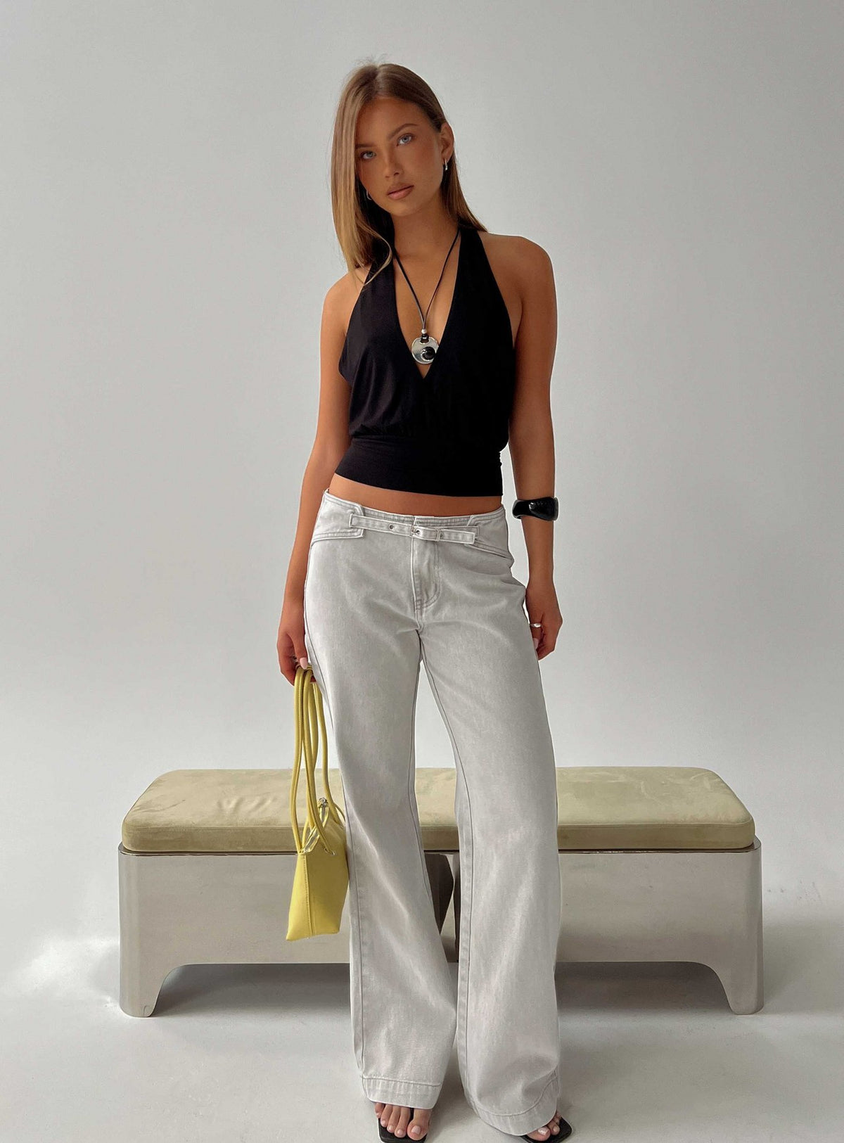 Introducing the Slow Ride Mid Rise Bootleg Belted Jeans Desert Grey in womens-jeans front view of model wearing Princess Polly