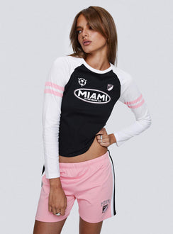 side view of model wearing Princess Polly Inter Miami Cf MLS Long Sleeve Black Full Sleeves Crew Neck 