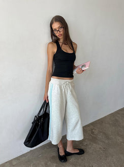 Showcasing the Dojo 3/4 Track Pants Grey Marle in womens regular pants with mid-rise front view of model wearing Princess Polly