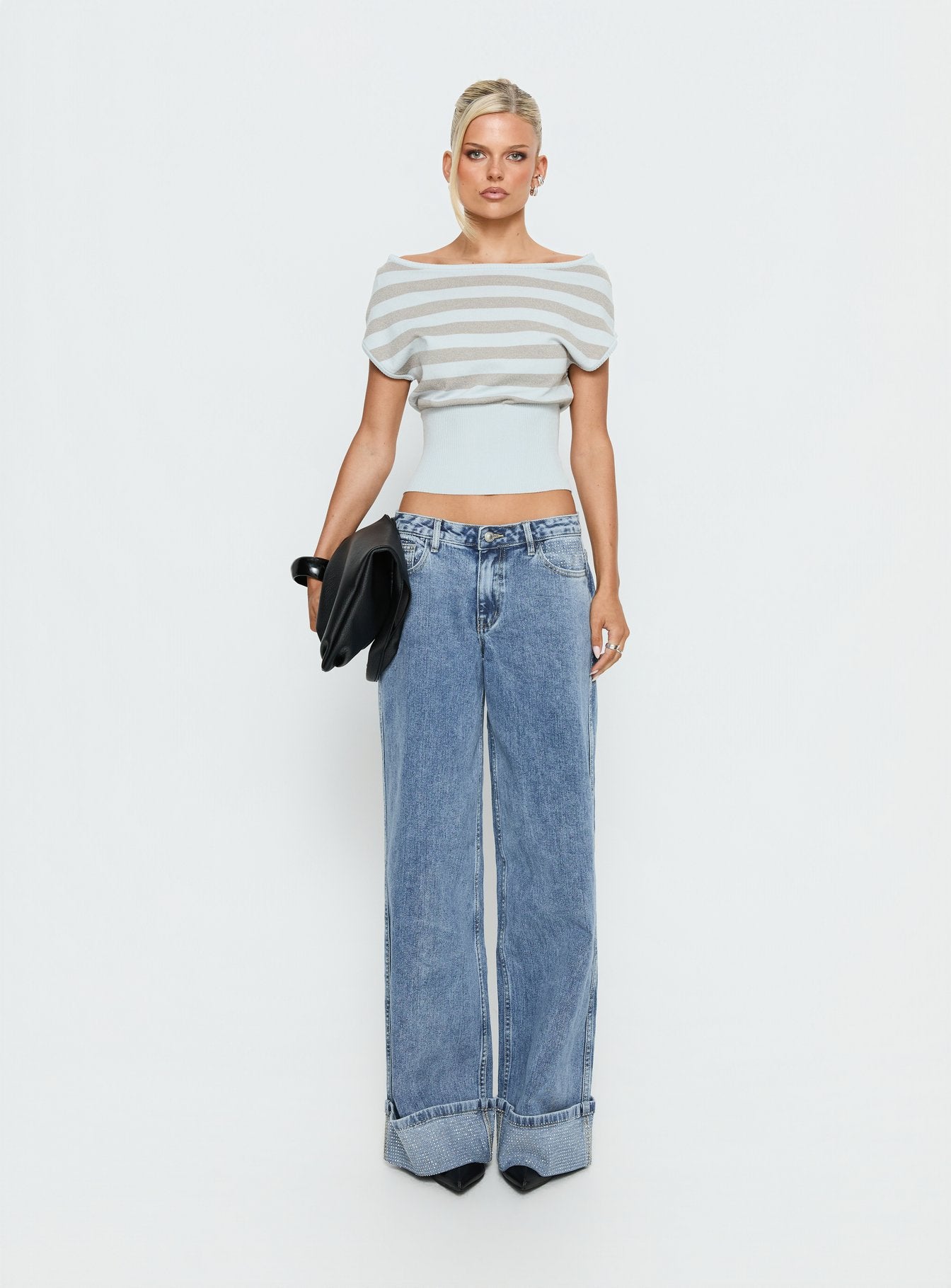 front view of model wearing Princess Polly Ramos Diamante Low Rise Wide Leg Jeans Washed Mid Blue Low Rise Jeans 