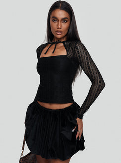 back view of model wearing Princess Polly Worth My Time Tie Neck Cut Out Top Black Full Sleeves High Neck 