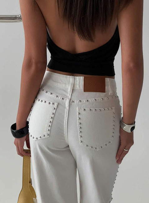 Displaying the Saving Up Mid Rise Straight Leg Studded Jeans White in womens-jeans with silver studded pockets and belt back view of model wearing Princess Polly