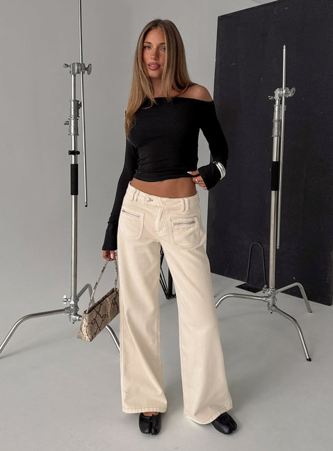front view of model wearing Princess Polly Lifetimes Mid Rise Wide Leg Cargo Jeans Cream Mid Rise Jeans Jeans 
