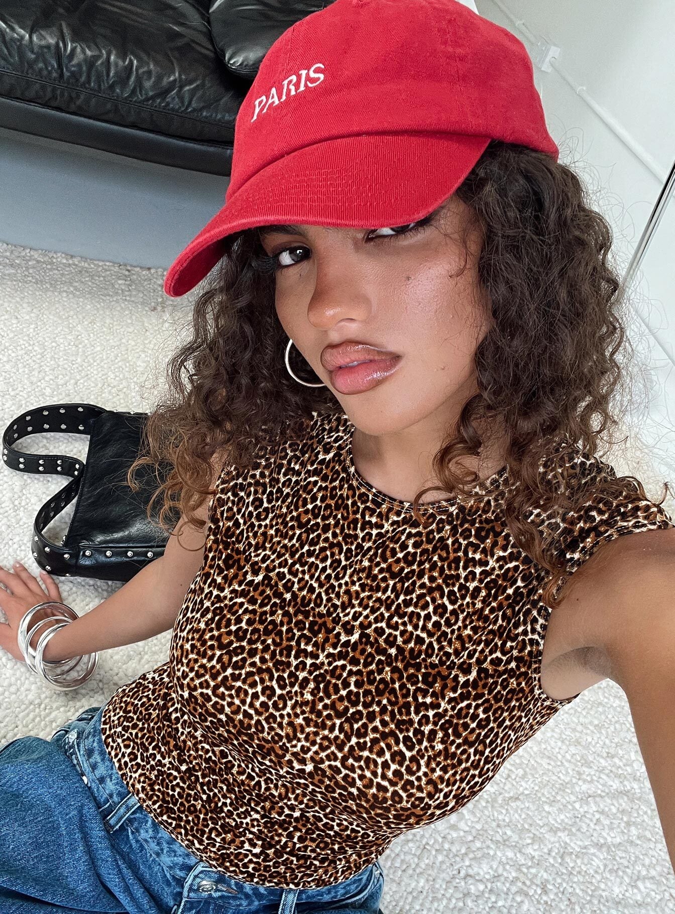 side view of model wearing Princess Polly Lure Top Leopard Sleeveless Crew Neck 