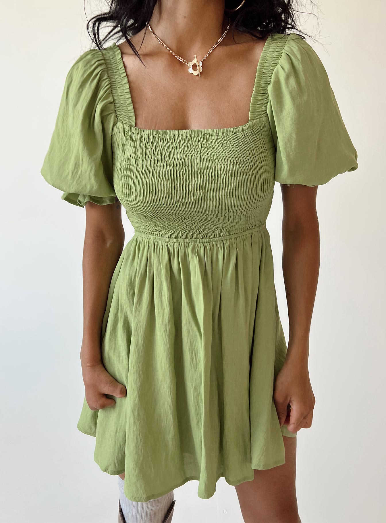 front view of model wearing Princess Polly Dani Mini Dress Green Square Neck 