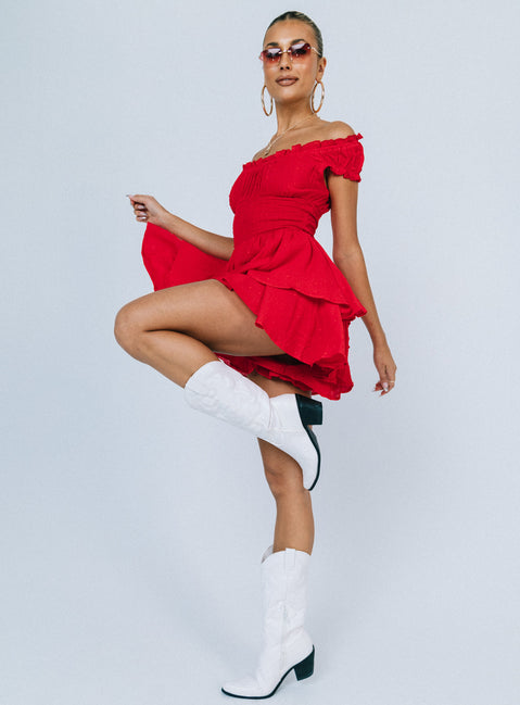 Romper Soft textured material Shirred waistband Ruffle detailing Elasticated neck and sleeves Good stretch   Fully lined