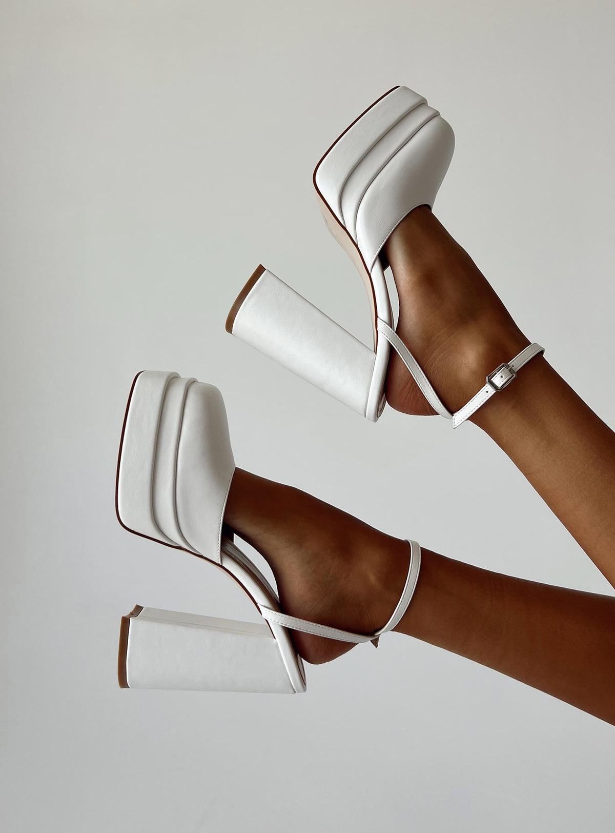 Heels Faux leather material  Closed toe  Block heel  Ankle buckle fastening  Platform base 