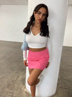   side view of model wearing Princess Polly Selby Mini Skirt Pink 