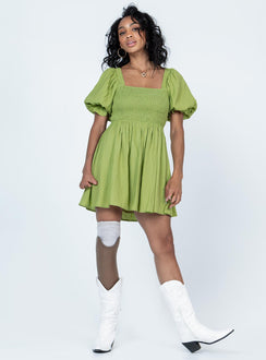 side view of model wearing Princess Polly Dani Mini Dress Green Square Neck 