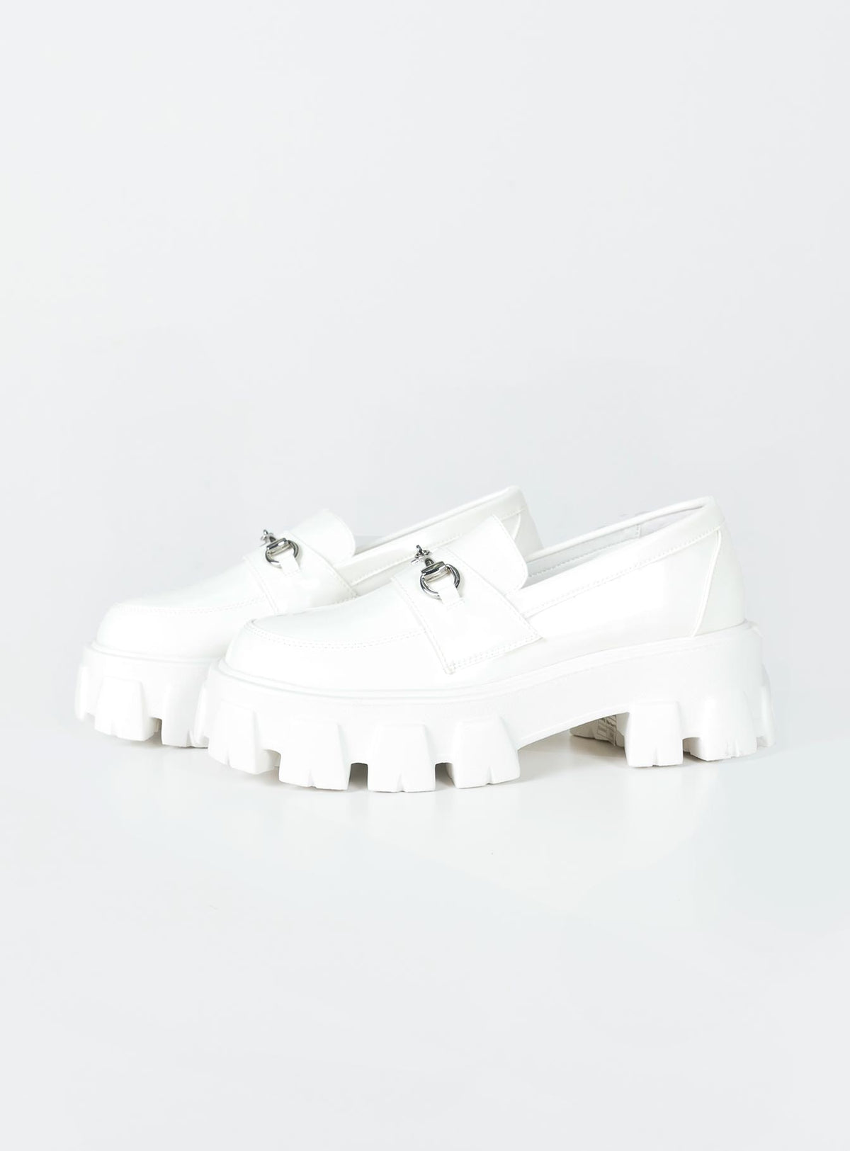 Loafers Faux leather Platform base Treaded sole Silver-toned snaffle detail Rounded toe