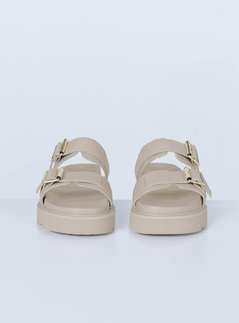 Sandals This product is PETA-Approved Vegan Double upper strap Both adjustable Chunky treaded sole Padded footbed Man made upper, lining & sole